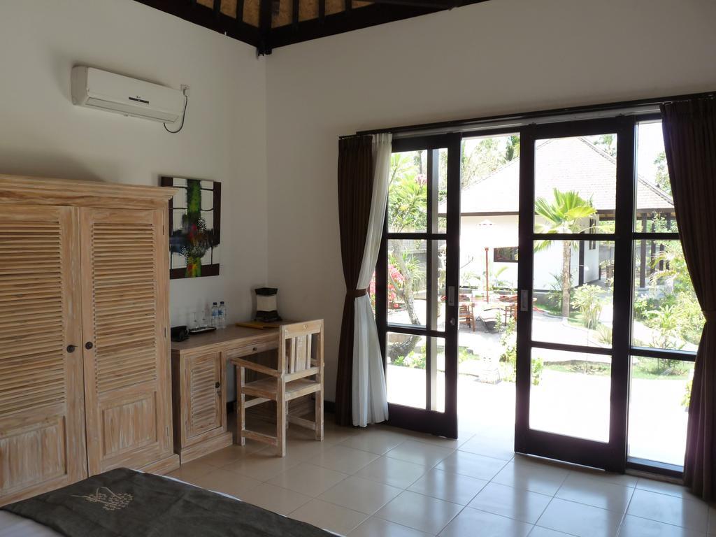 Taman Dewi Sri Villa Et Bungalow เปมูเตรัน ภายนอก รูปภาพ