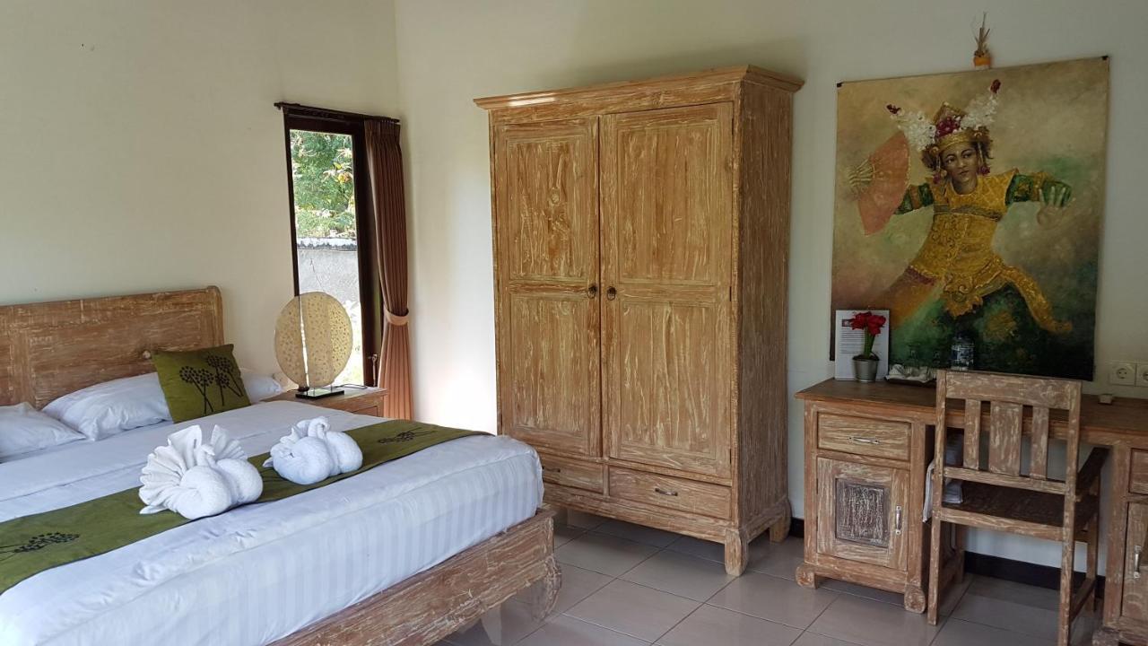 Taman Dewi Sri Villa Et Bungalow เปมูเตรัน ภายนอก รูปภาพ