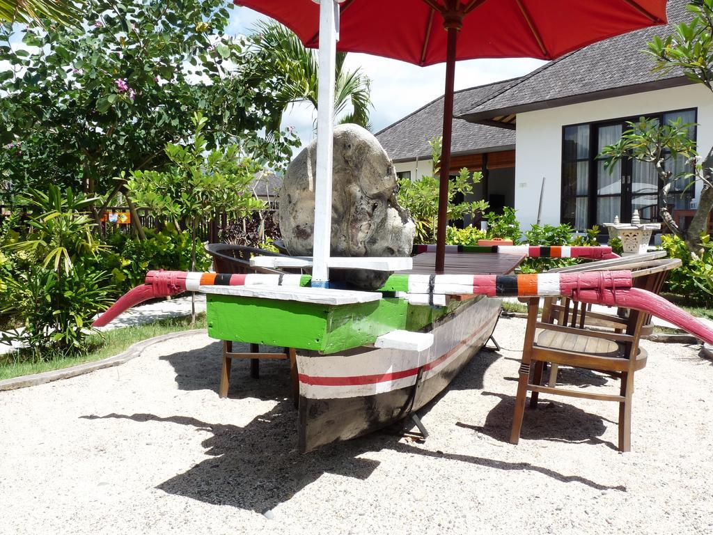 Taman Dewi Sri Villa Et Bungalow เปมูเตรัน ภายนอก รูปภาพ