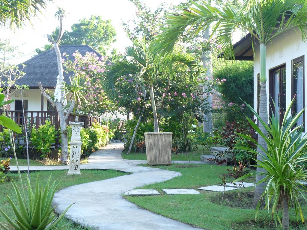 Taman Dewi Sri Villa Et Bungalow เปมูเตรัน ภายนอก รูปภาพ