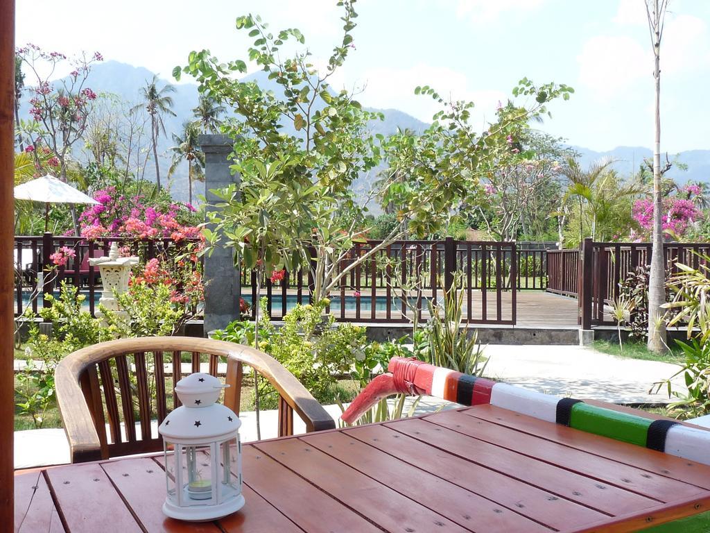 Taman Dewi Sri Villa Et Bungalow เปมูเตรัน ภายนอก รูปภาพ