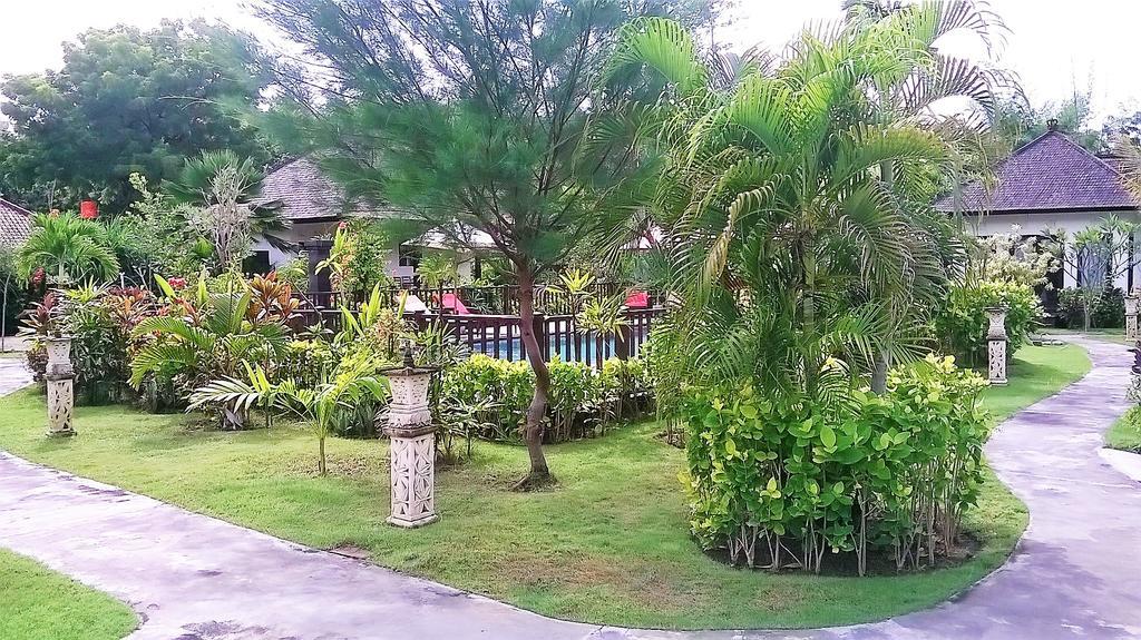 Taman Dewi Sri Villa Et Bungalow เปมูเตรัน ภายนอก รูปภาพ