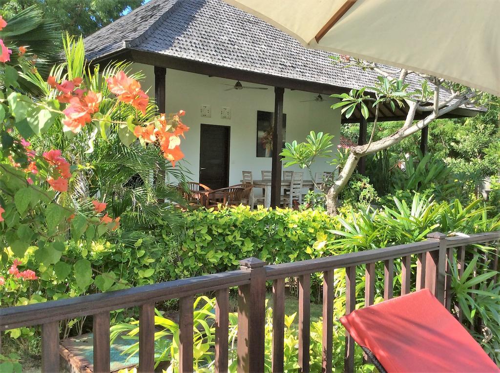 Taman Dewi Sri Villa Et Bungalow เปมูเตรัน ภายนอก รูปภาพ