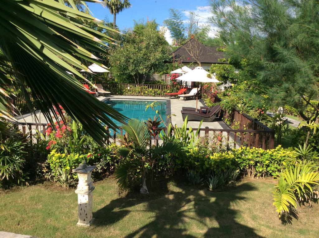 Taman Dewi Sri Villa Et Bungalow เปมูเตรัน ภายนอก รูปภาพ