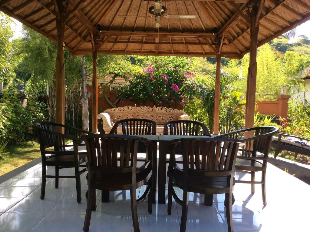 Taman Dewi Sri Villa Et Bungalow เปมูเตรัน ภายนอก รูปภาพ