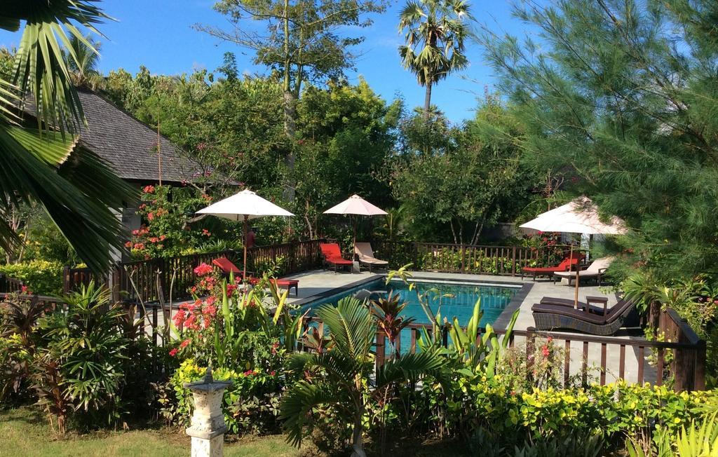 Taman Dewi Sri Villa Et Bungalow เปมูเตรัน ภายนอก รูปภาพ